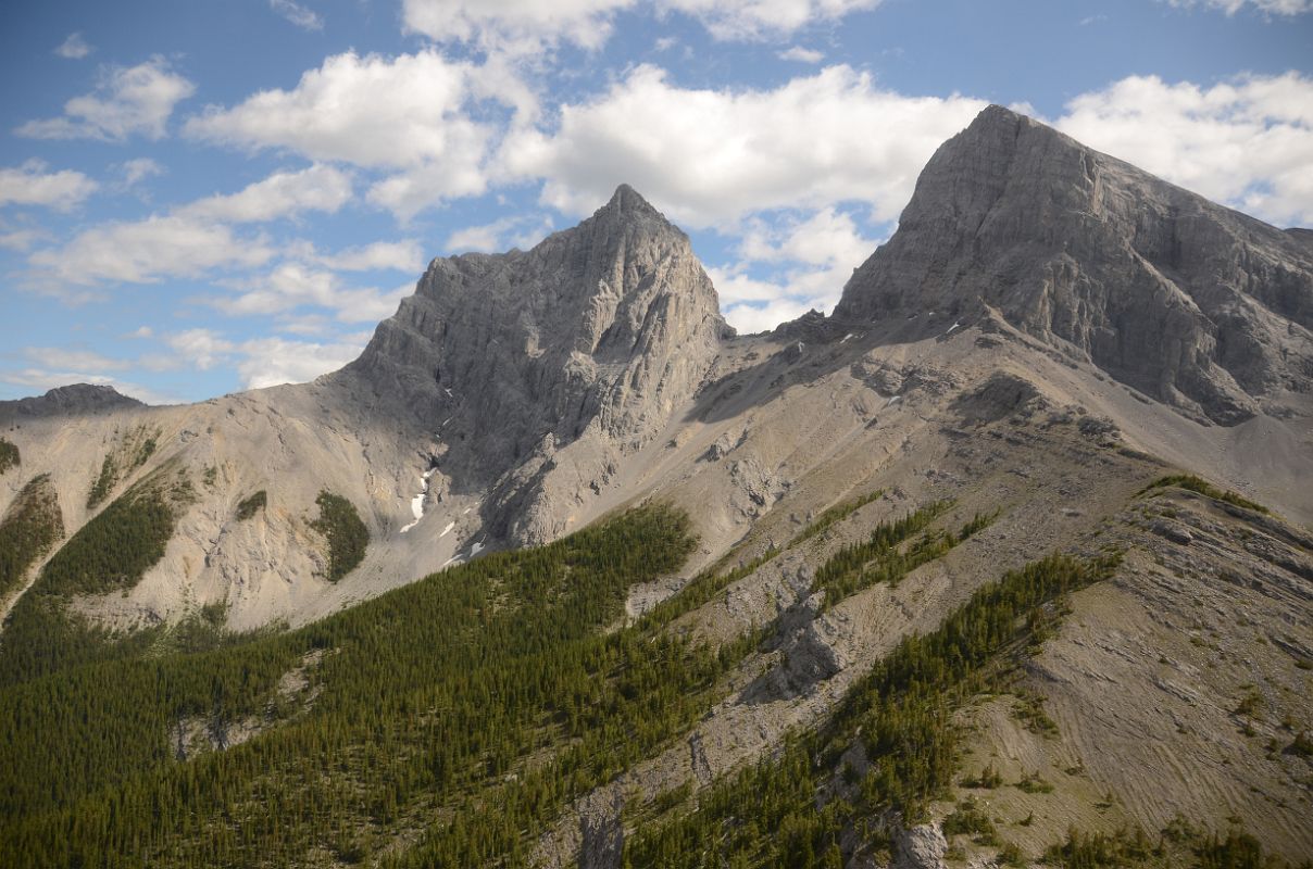 12C Two Of The Three Sisters - Charity Peak and Hope Peak From Just After Three Sisters Pass As Helicopter From Lake Magog Nears Canmore In Summer